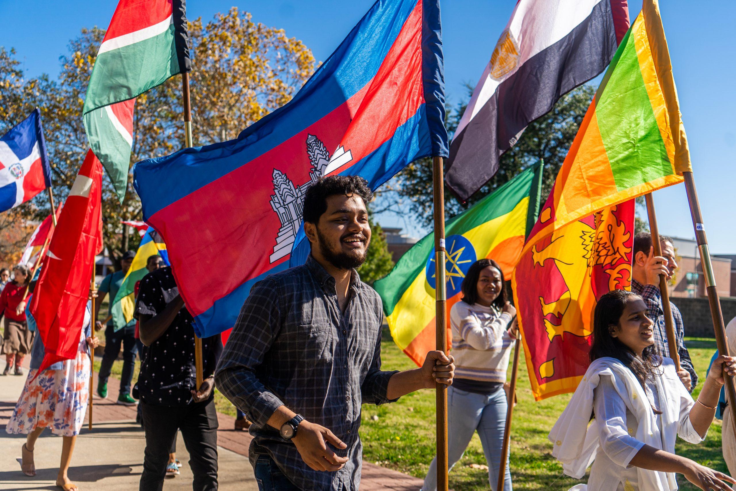 students holding flags
